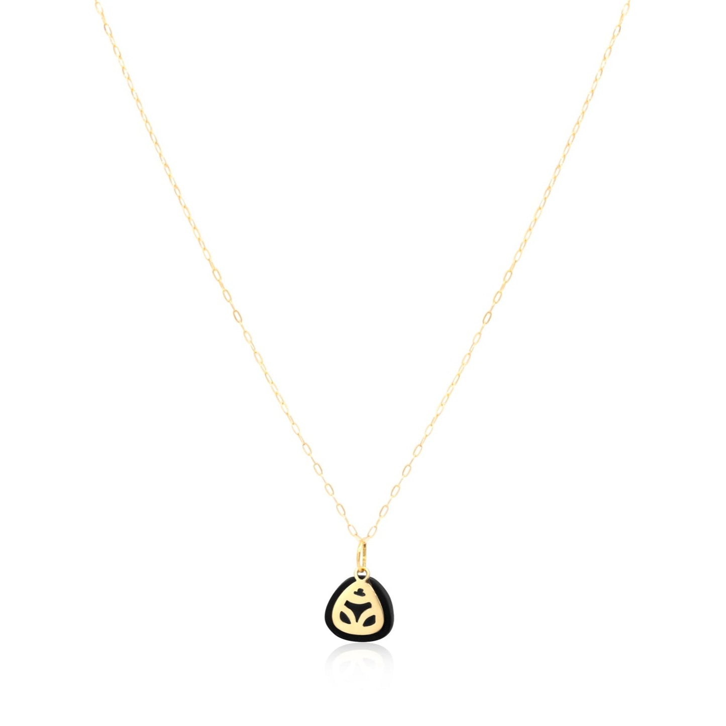 18k gold necklace with a coconut skin frog pendant. The pendant is a symbol of the muiraquitã, a legendary Amazonian amulet representing female strength and good luck