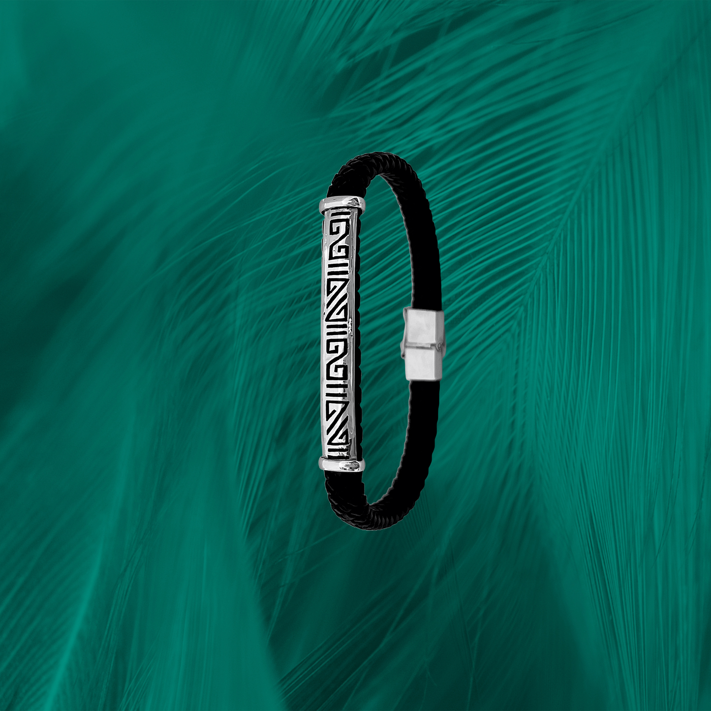 Handcrafted bracelet with sterling silver tribal design on vegan leather. Symbolizes heritage & eco-consciousness.