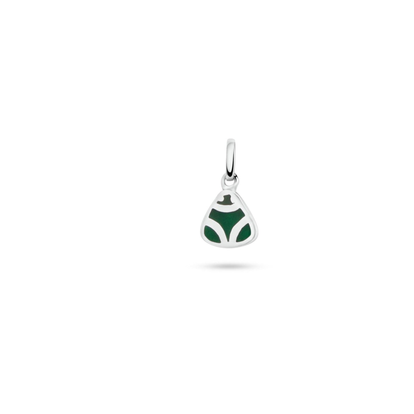 silver muiraquitã pendant with a green inlay, showcasing symmetrical, leaf-like designs, reflects Amazonian cultural motifs and hangs gracefully on a simple bail.