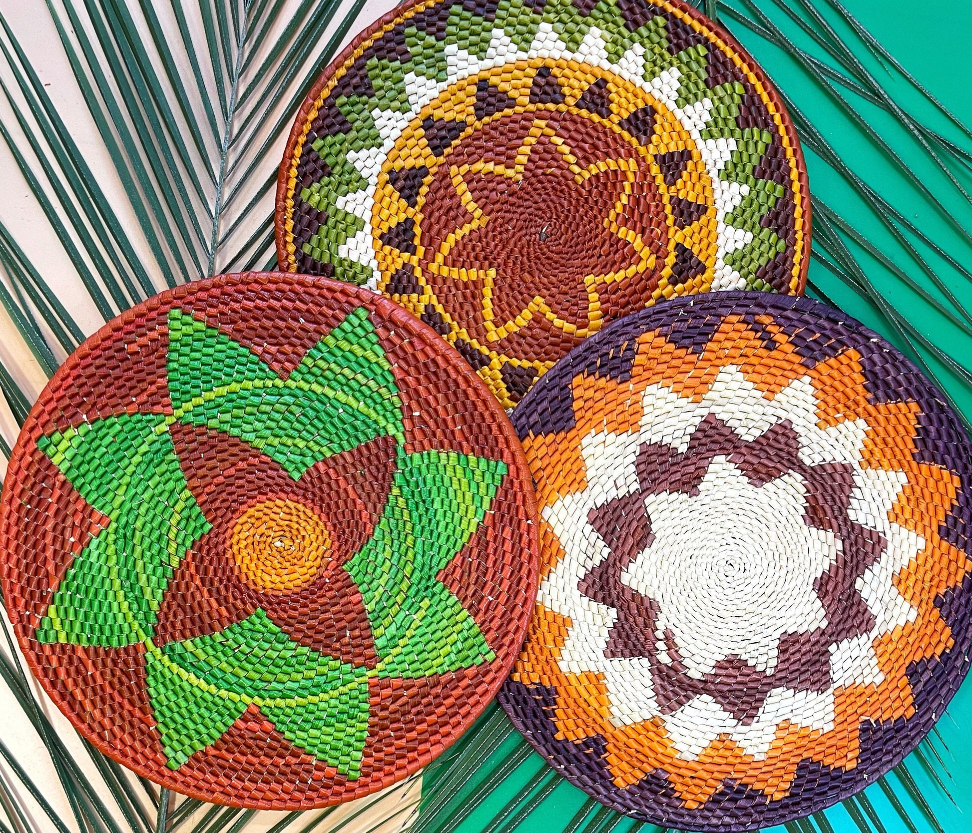 Handwoven tucumã palm placemats bring natural beauty to your table with their round shape, textured weave, and warm tones of beige, cream, and light brown.