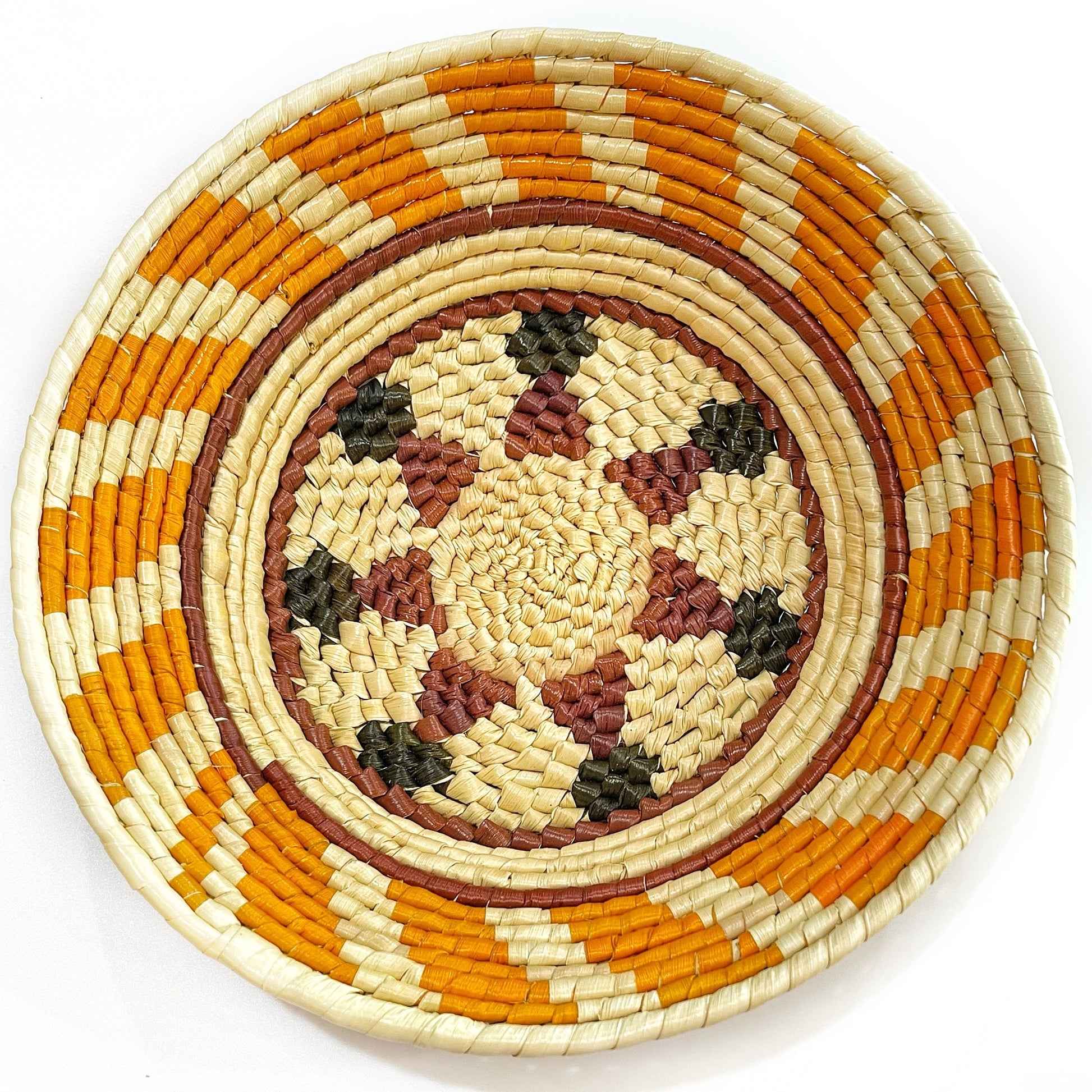 Bowls with pattern showcases a harmonious blend of colors, including warm orange, creamy white, deep brown, and a reddish hue, arranged in a complex and appealing design