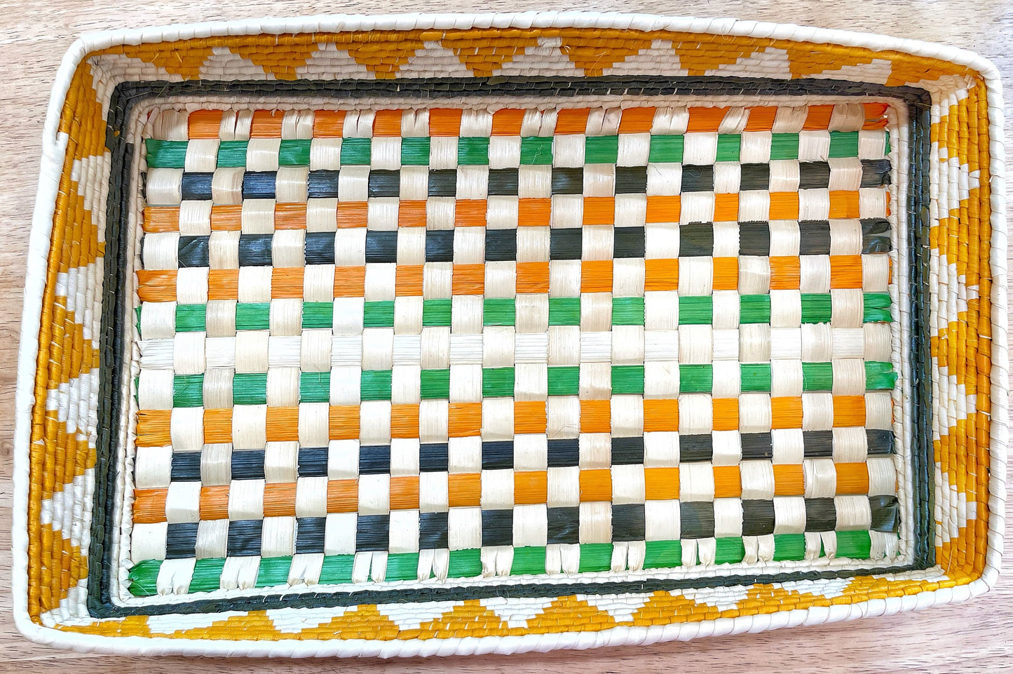 Handwoven Amazonian tray in vibrant white, orange, green & dark green. Checkerboard pattern with reinforced corners. Earthy & beautiful.