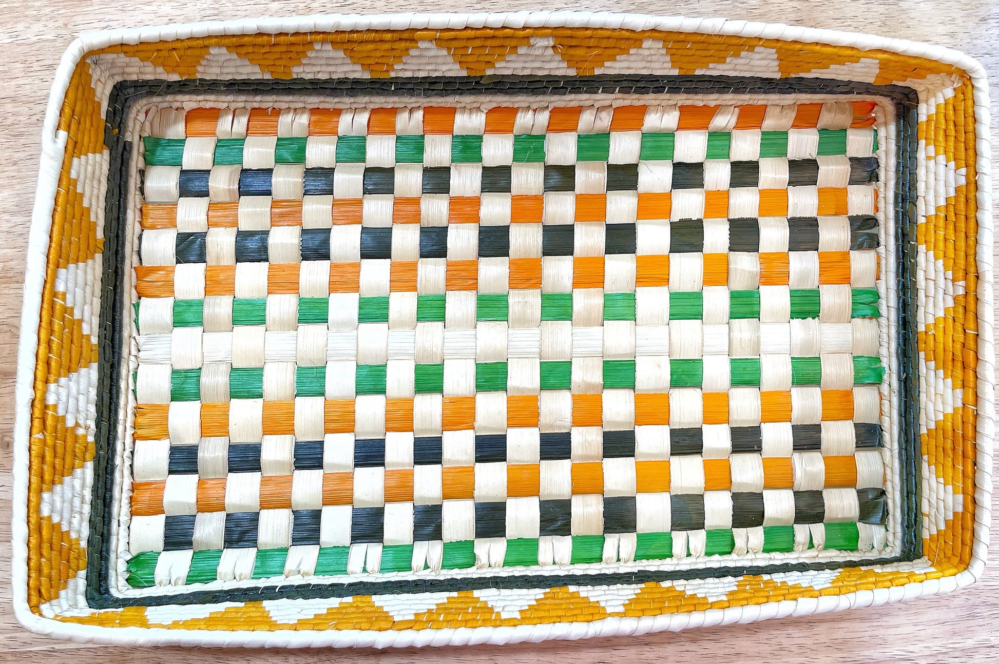 Handwoven Amazonian tray in vibrant white, orange, green & dark green. Checkerboard pattern with reinforced corners. Earthy & beautiful.