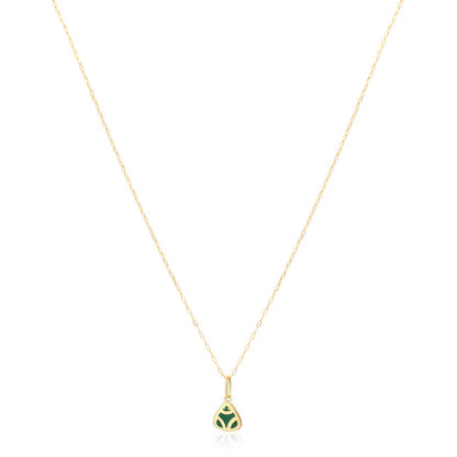 Handcrafted 18k gold necklace and pendant. Captivating green hue achieved with eco-friendly malachite powder. Depicts a muiraquita frog, a legendary Amazonian symbol.