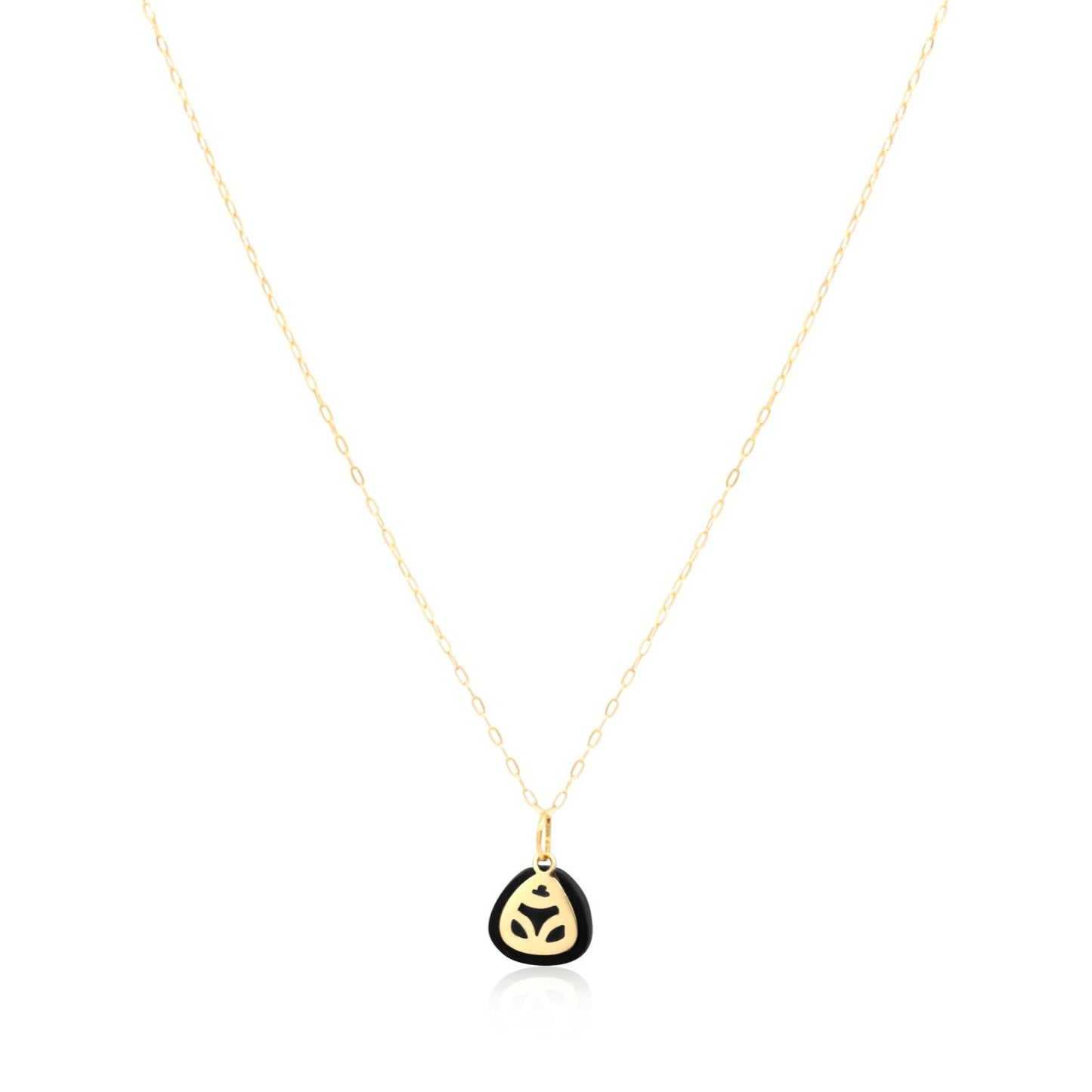 18k gold necklace with a coconut skin frog pendant.  The pendant is a symbol of the muiraquitã, a legendary Amazonian amulet representing female strength and good luck