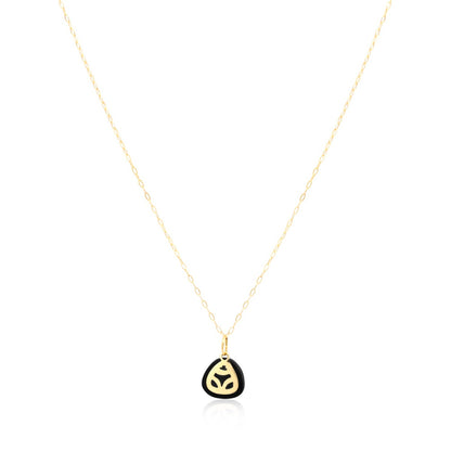 18k gold necklace with a coconut skin frog pendant.  The pendant is a symbol of the muiraquitã, a legendary Amazonian amulet representing female strength and good luck