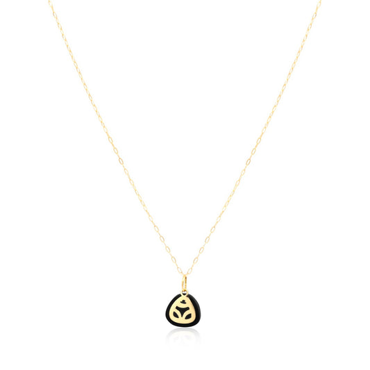 18k gold necklace with a coconut skin frog pendant.  The pendant is a symbol of the muiraquitã, a legendary Amazonian amulet representing female strength and good luck