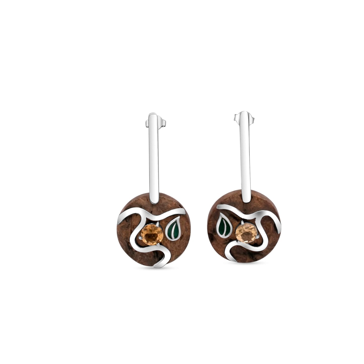 Sterling silver earrings featuring handcrafted Brazil nut elements, sparkling citrine stones, and leafy green accents.