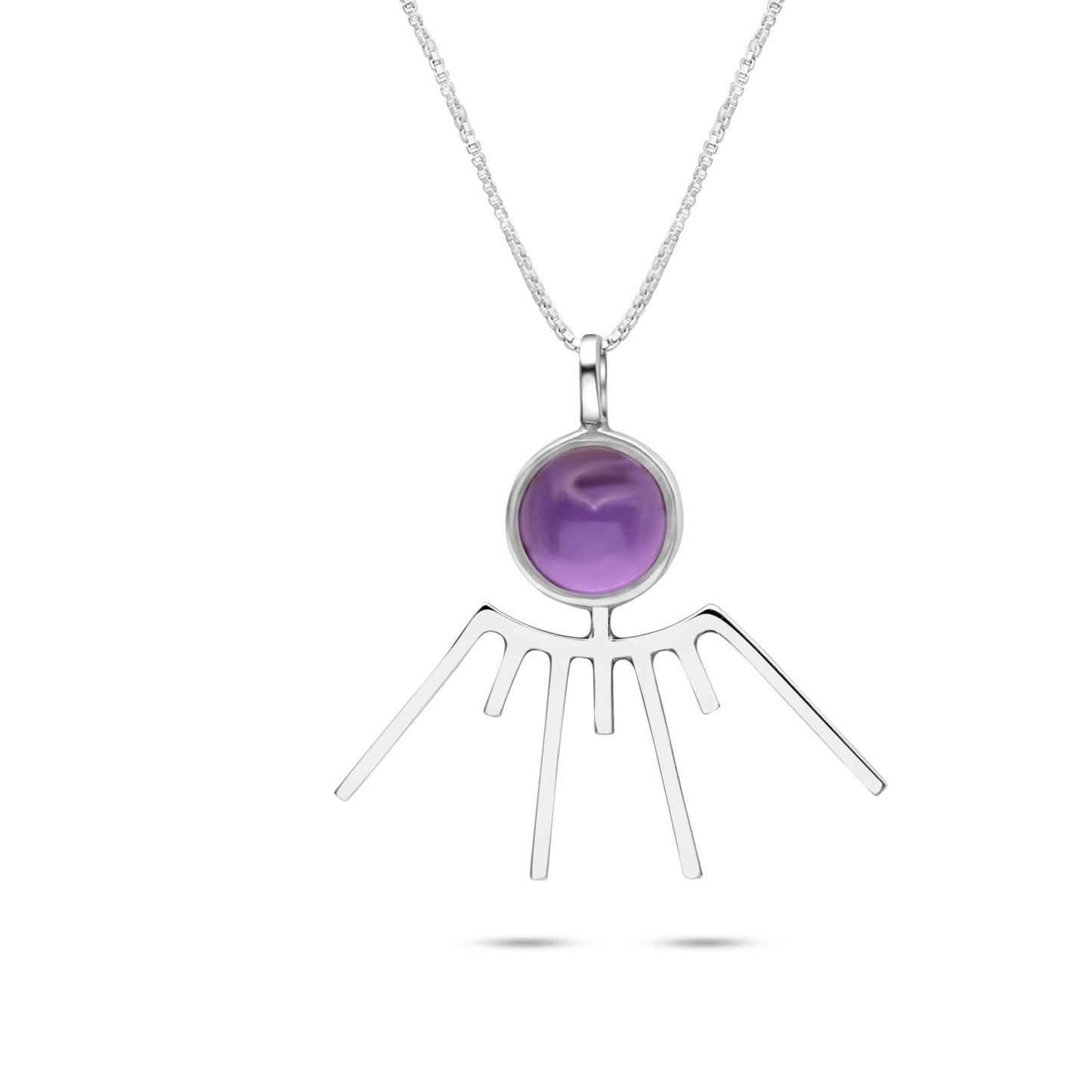 Close-up view of a silver sunray pendant necklace. The pendant features a single, round amethyst gemstone with a deep purple color at its center. Light reflects off the polished silver, creating a radiant glow