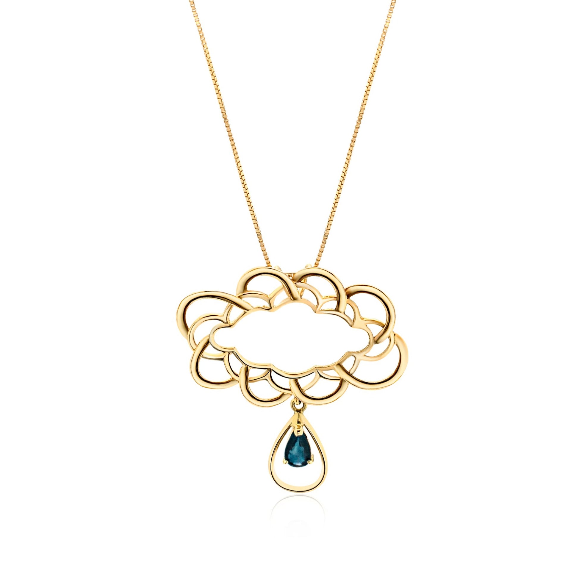 An 18k gold necklace with a cloud-like pendant and a blue sapphire drop.