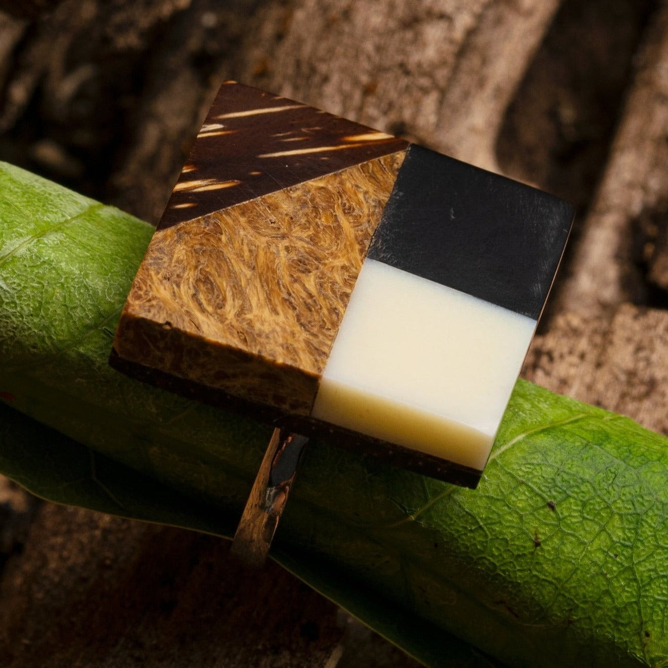 Artisan-made ring crafted from high-quality .925 sterling silver, showcasing a distinctive geometric design created using recycled materials such as babassu, bone, horn, and peach palm