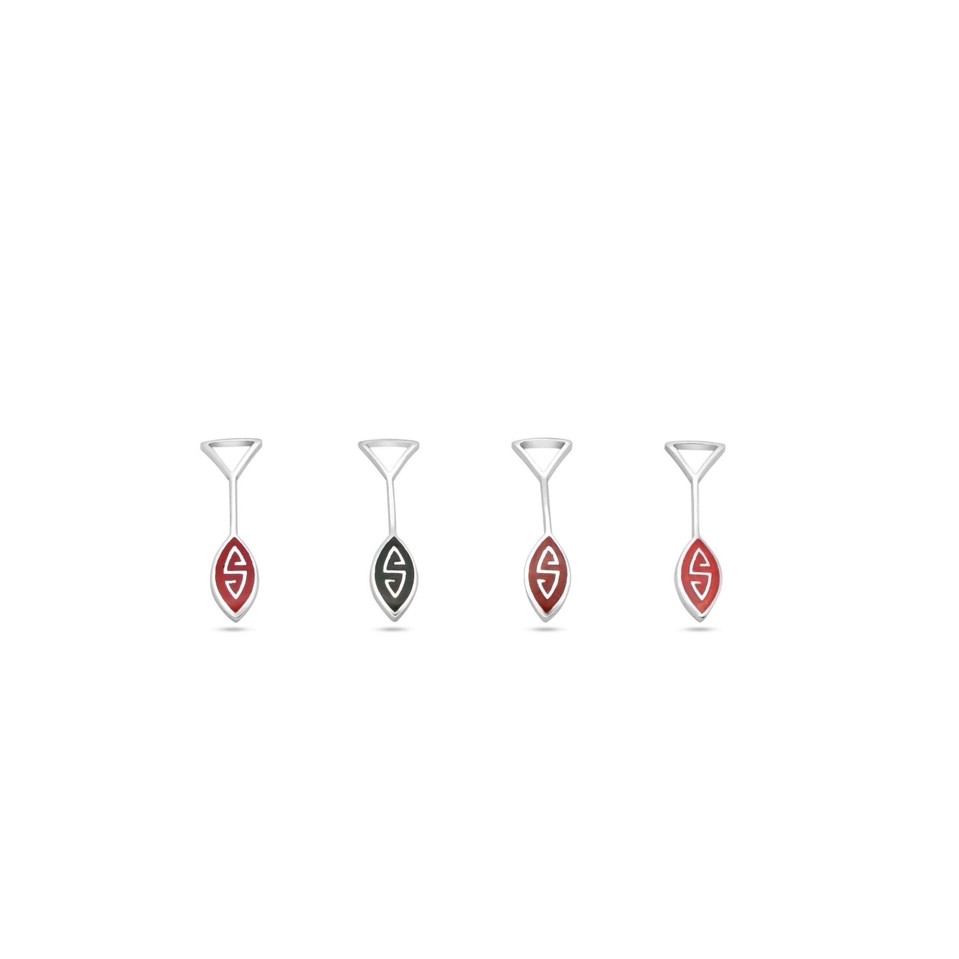 Four striking OAR pendants in .925 silver. Red & black inlay symbolizes Amazonian strength. 'S' symbol adds intrigue. Inspired by river journeys