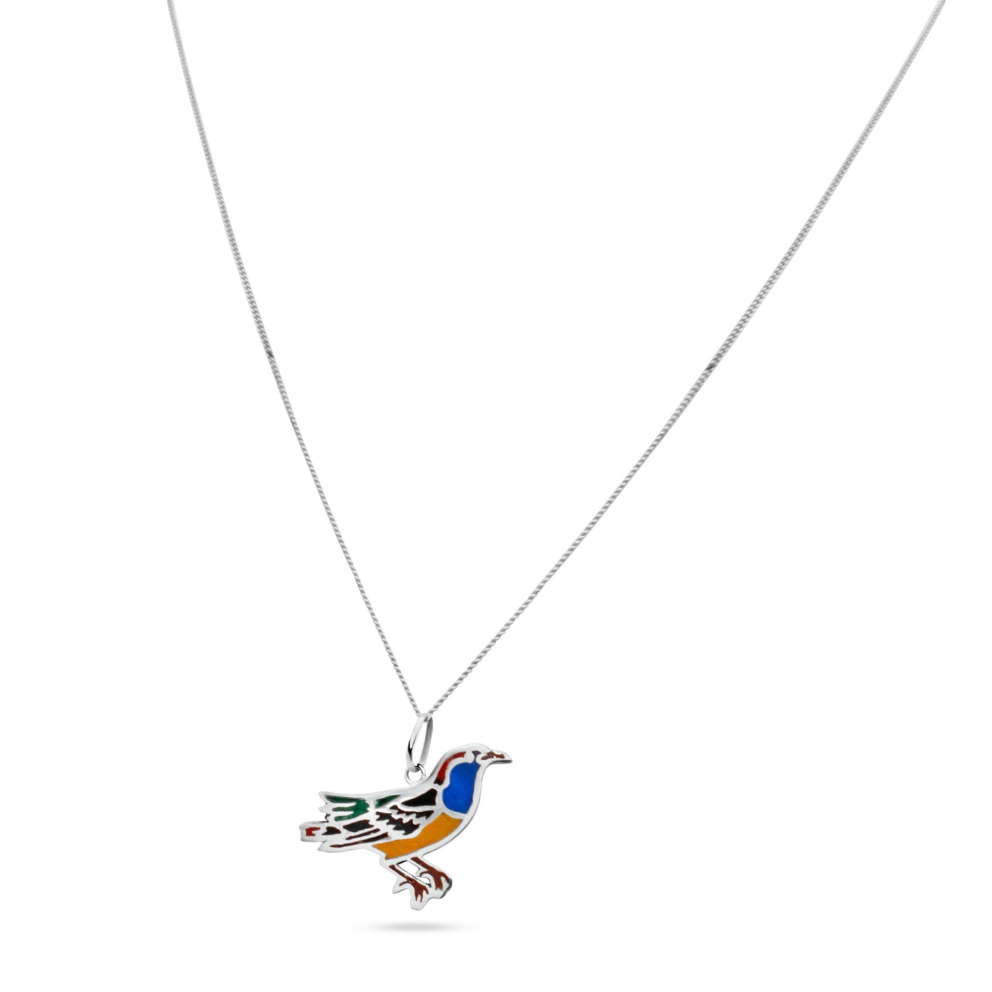 The necklace has a sterling silver Uirapuru bird pendant with colorful inlays: blue crest, black wings, red and green tail, symbolizing Amazonian nature, believed to bring love and happiness.