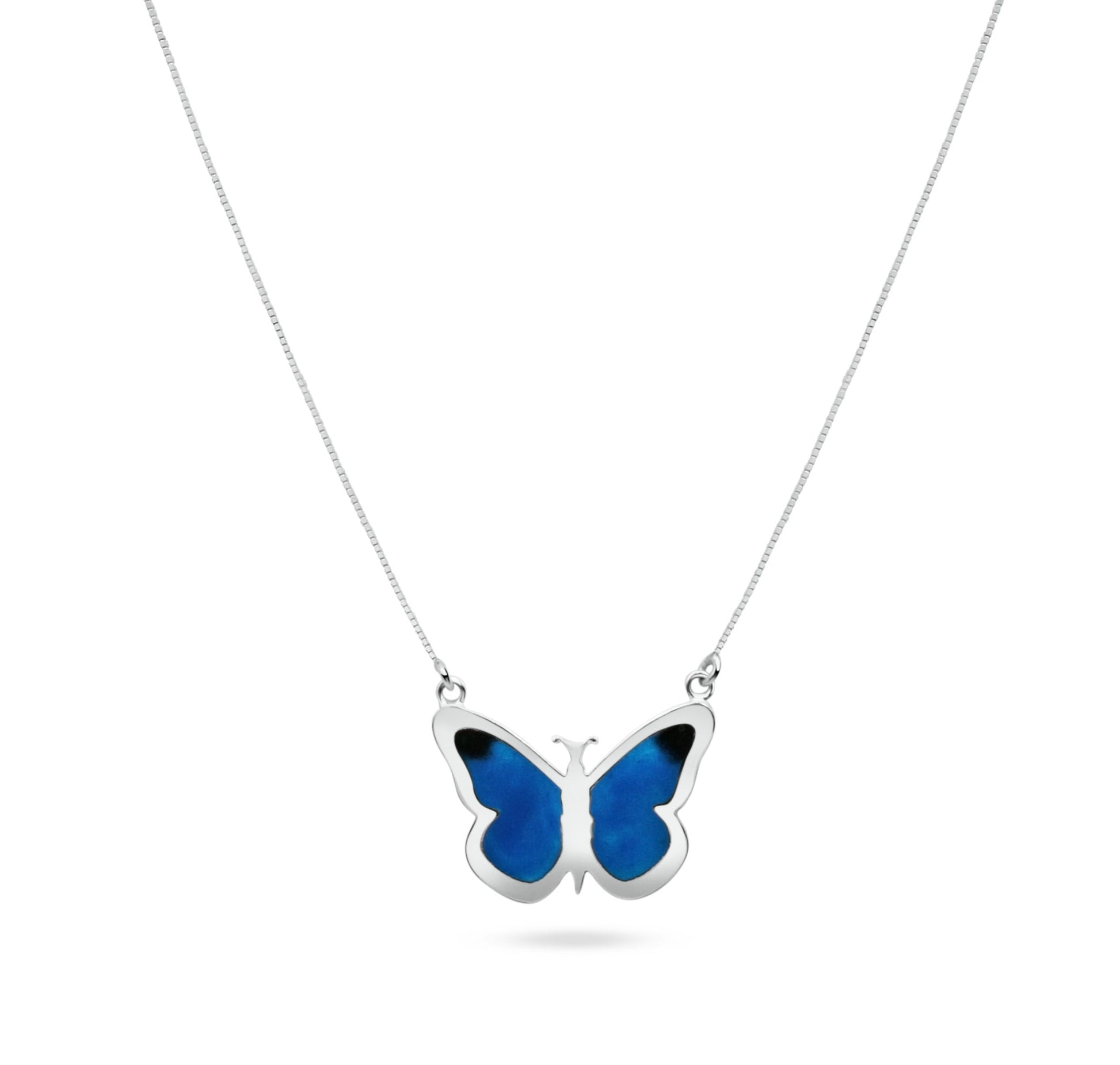 .925 sterling silver necklace featuring a blue butterfly pendant. The blue color and black accents are achieved with a local Brazilian inlay technique. 