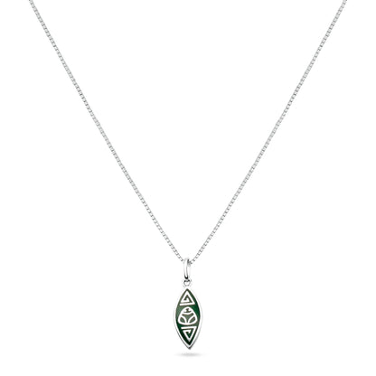 A silver necklace with a canoe-shaped pendant from the Marajoara Collection, featuring a central muiraquitã symbol, held sacred by Amazonian indigenous cultures, accented by triangular forms at each end