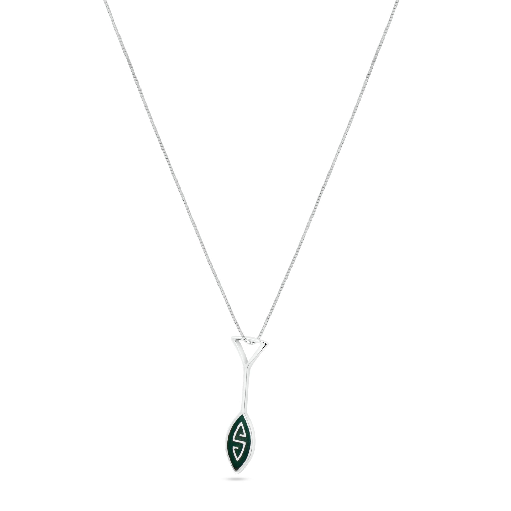 Marajoara pendant necklace in sterling silver. Green inlay (local technique) adorns the oar-shaped pendant, symbolizing Amazonian river navigation