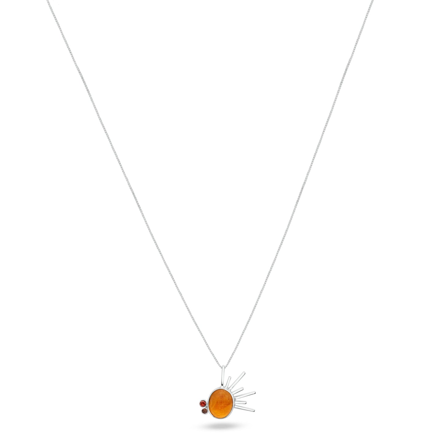 Sterling silver necklace with a radiant sun-inspired pendant, centered with a golden tucupi gemstone, flanked by garnet and smoky quartz, on a white backdrop.